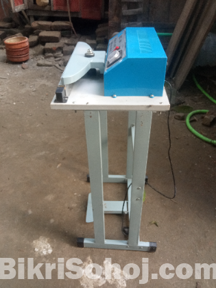 Packet sealing machine